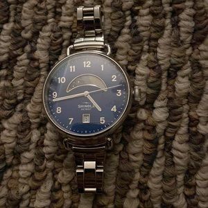 Shinola silver watch ( the watch is one size and it’s never been worn )